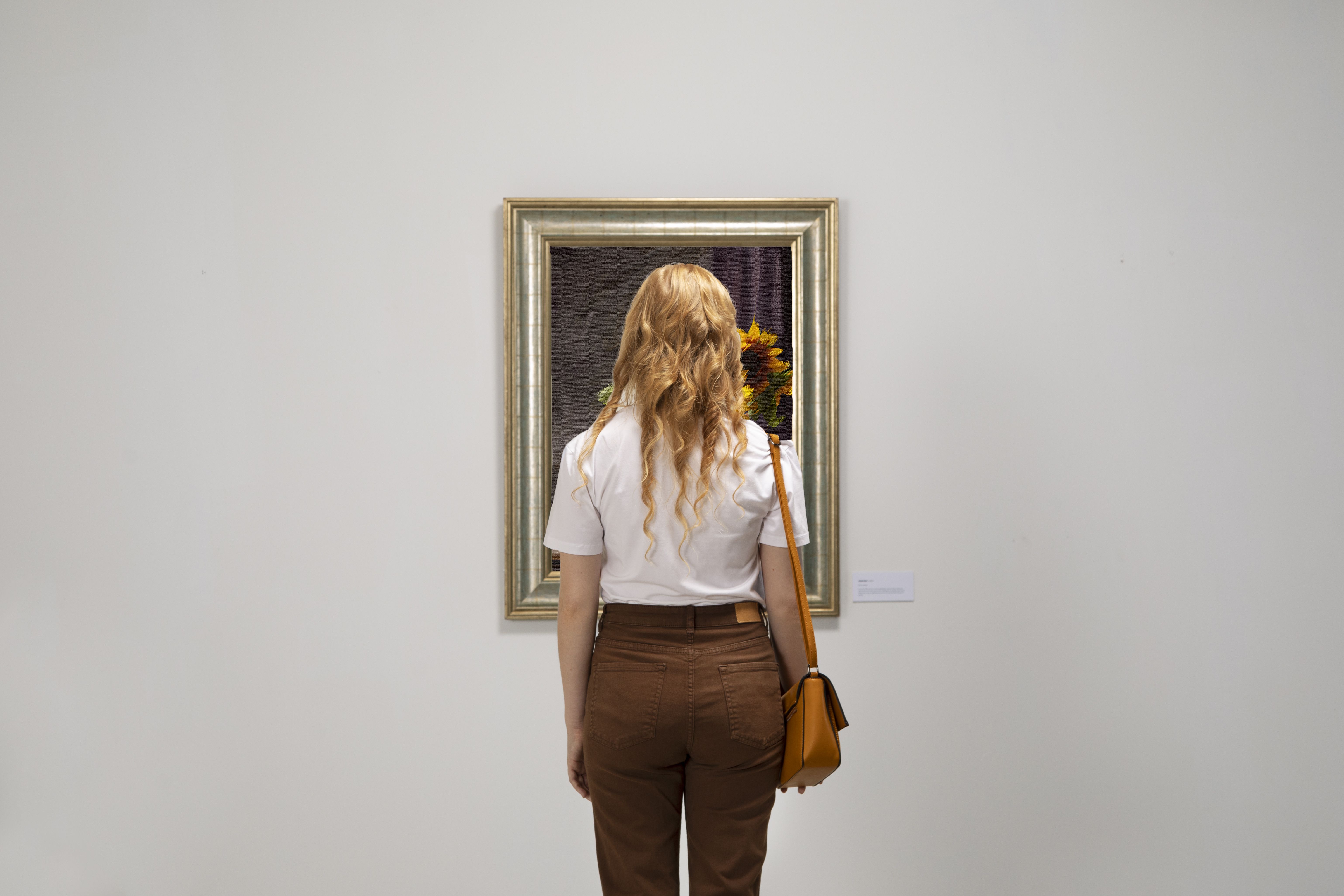 back-view-woman-admiring-painting
